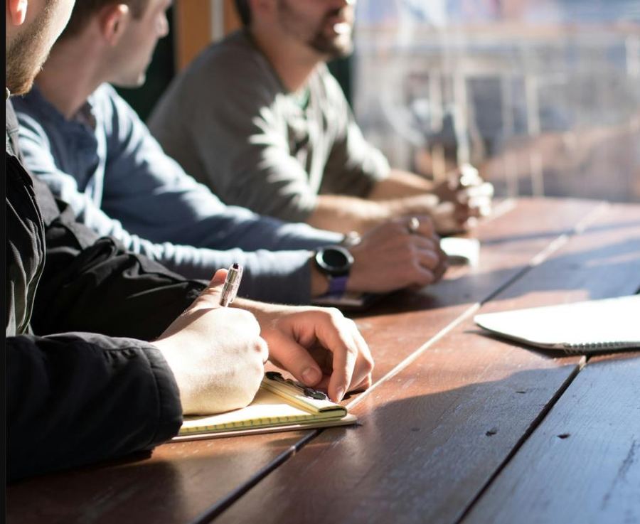 A small business consultation session around a table